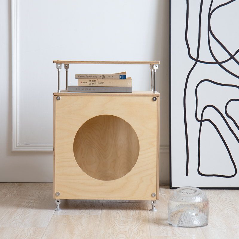 CheerMoe Haven Cat House styled in a modern room with its round entrance facing forward
