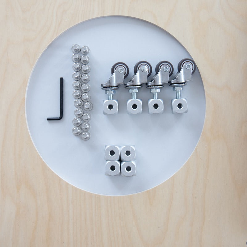 Caster wheels, fittings and an Allen key for assembling the Haven Cat House Stool