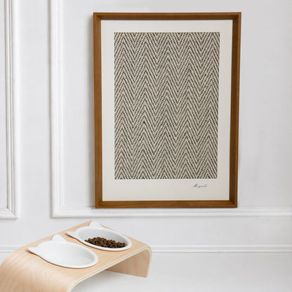 Gallery framed sisal cat scratcher mounted above a modern pet feeder