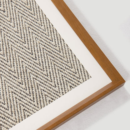 Close-up of the herringbone sisal surface and solid wood frame