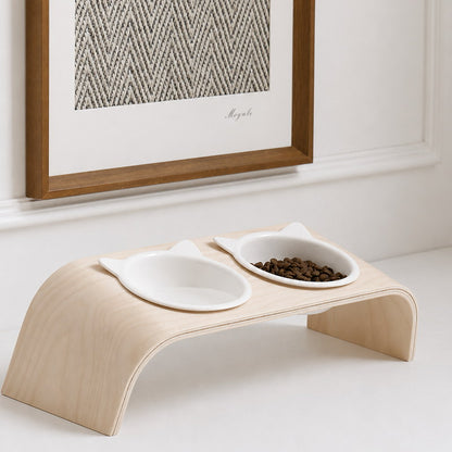 Mori double cat bowl set displayed beneath framed wall art